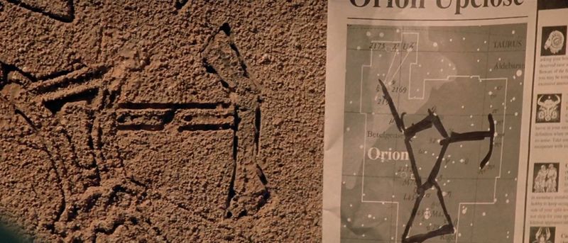 File:Daniel Jackson compares the symbols.jpg